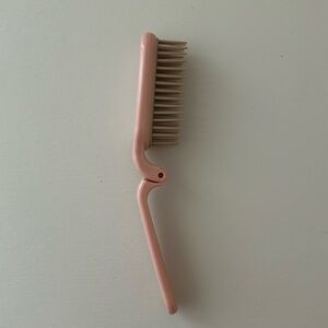 NWT small plastic pink foldable brush